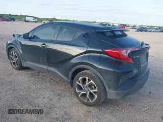 2018 Toyota C-HR XLE with VIN JTNKHMBX6J1007058, listed as a IAAI auction lot 42100587 with 71,725 mi miles and . Bid and sale history available at DreamBid. Image 3.
