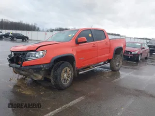 2019 Chevrolet Colorado 4WD ZR2 z VIN 1GCGTEEN1K1160280, wystawiony jako IAAI lot #41166240 z przebiegiem 71 529 mil mil oraz . Historia ofert i sprzedaży dostępna na DreamBid. Obrazek 2.