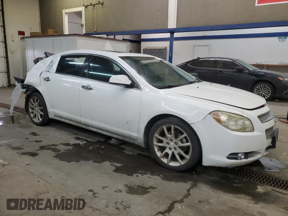 2012 Chevrolet Malibu LTZ with VIN 1G1ZG5E79CF259389, listed as a Copart auction lot 44201685 with 162,198 mi miles and Salvage Title. Bid and sale history available at DreamBid. Image 4.
