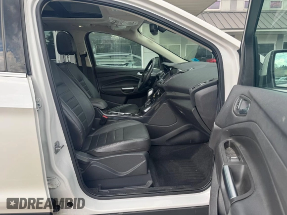 2014 Ford Escape Titanium with VIN 1FMCU9J94EUC63638, listed as a Copart auction lot 55880505 with 198,112 mi miles and Clean Title. Bid and sale history available at DreamBid. Image 5.
