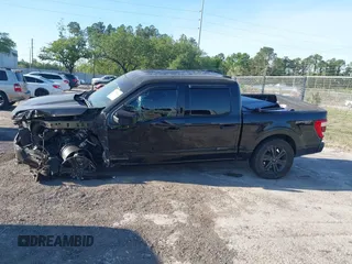 2021 Ford F-150 XL with VIN 1FTFW1E17MFC21307, listed as a IAAI auction lot 41875224 with 116,911 mi miles. Bid and sale history available at carsss.com. Image 14.