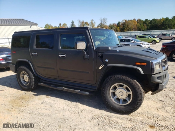 2005 Hummer H2 SUV with VIN 5GRGN23U65H108432, listed as a Copart auction lot 76786844 with 248,780 mi miles and Salvage Title. Bid and sale history available at carsss.com. Image 4.