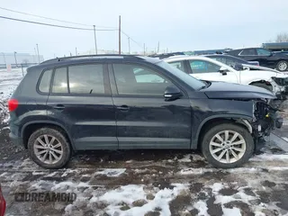 2017 Volkswagen Tiguan S with VIN WVGBV7AX7HK047973, listed as a IAAI auction lot 41197329 with 92,960 mi miles and . Bid and sale history available at DreamBid. Image 13.
