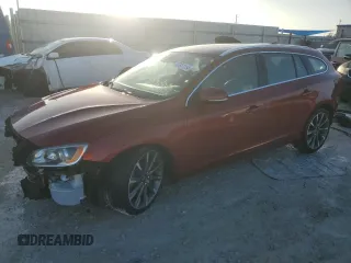 2015 Volvo V60 T5 Drive-E Premier with VIN YV140MEK7F1264851, listed as a Copart auction lot 77811154 with 65,711 mi miles and Salvage Title. Bid and sale history available at carsss.com. Image 1.