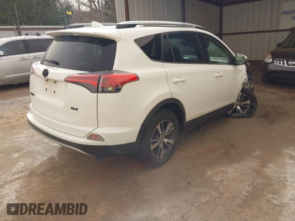 2018 Toyota RAV4 XLE with VIN JTMWFREV2JJ730568, listed as a IAAI auction lot 41814302 with 108,622 mi miles and . Bid and sale history available at DreamBid. Image 4.