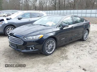 2014 Ford Fusion SE Hybrid with VIN 3FA6P0LU2ER133294, listed as a IAAI auction lot 41696064 with 150,537 mi miles. Bid and sale history available at carsss.com. Image 2.