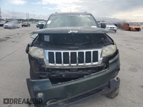 2011 Jeep Grand Cherokee Laredo z VIN 1J4RR4GG1BC520579, wystawiony jako Copart lot #60860794 z przebiegiem 196 271 mil mil oraz Szkoda całkowita • Salvage title. Historia ofert i sprzedaży dostępna na DreamBid. Obrazek 5.