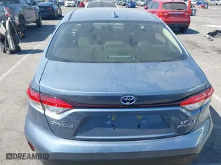 2024 Toyota Corolla Hybrid LE with VIN JTDBCMFE5RJ030239, listed as a IAAI auction lot 40489207 with 5,295 mi miles. Bid and sale history available at carsss.com. Image 17.