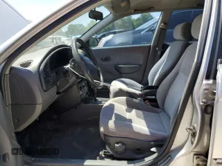 2004 Kia Spectra GS with VIN KNAFB161945141309, listed as a Copart auction lot 52395445 with 99,100 mi miles and Clean Title. Bid and sale history available at DreamBid. Image 7.