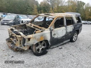 2015 Chevrolet Tahoe LTZ z VIN 1GNSKCKC6FR581219, wystawiony jako Copart lot #77699404 z przebiegiem Nie podano mil oraz Nie do naprawy • Non repairable. Historia ofert i sprzedaży dostępna na DreamBid. Obrazek 1.