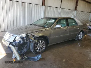 2010 Cadillac DTS 1SC z VIN 1G6KD5EYXAU119017, wystawiony jako Copart lot #56149775 z przebiegiem 113 617 mil mil oraz Szkoda całkowita • Salvage title. Historia ofert i sprzedaży dostępna na DreamBid. Obrazek 1.