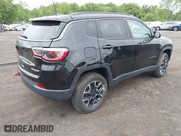 2019 Jeep Compass Trailhawk with VIN 3C4NJDDB7KT727762, listed as a IAAI auction lot 42299260 with 56,733 mi miles and . Bid and sale history available at DreamBid. Image 4.