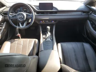 2021 Mazda 6 Signature with VIN JM1GL1XY5M1614601, listed as a Copart auction lot 73769893 with 22,617 mi miles and . Bid and sale history available at DreamBid. Image 8.