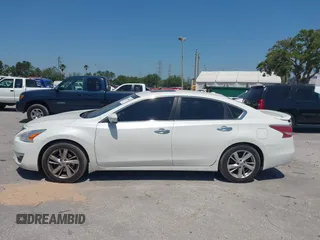 2015 Nissan Altima S with VIN 1N4AL3AP5FN405734, listed as a IAAI auction lot 42059082 with 90,651 mi miles and . Bid and sale history available at DreamBid. Image 14.