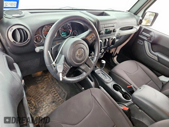 2016 Jeep Wrangler Black Bear with VIN 1C4AJWAG0GL104173, listed as a Copart auction lot 63565415 with 52,922 mi miles and Salvage title. Bid and sale history available at DreamBid. Image 8.