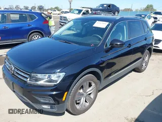 2021 Volkswagen Tiguan SE with VIN 3VV3B7AX1MM045478, listed as a IAAI auction lot 41947899 with 56,694 mi miles and . Bid and sale history available at DreamBid. Image 17.