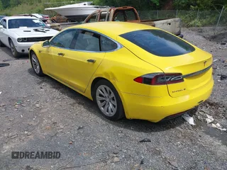 2016 Tesla Model S 70 kWh Battery with VIN 5YJSA1E14GF141579, listed as a IAAI auction lot 42209119 with 105,947 mi miles and . Bid and sale history available at carsss.com. Image 3.