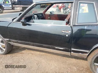 1984 Chevrolet Monte Carlo z VIN 1G1AZ37H9ER201513, wystawiony jako IAAI lot #42416804 z przebiegiem 80 467 mil mil oraz . Historia ofert i sprzedaży dostępna na DreamBid. Obrazek 6.