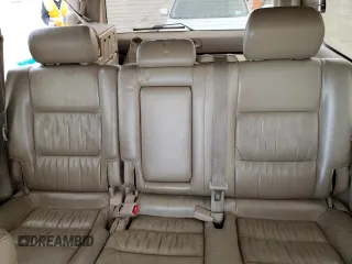 2000 Toyota Land Cruiser z VIN JT3HT05J4Y0088451, wystawiony jako Copart lot #52208905 z przebiegiem 329 751 mil mil oraz Nie do naprawy • Non repairable. Historia ofert i sprzedaży dostępna na DreamBid. Obrazek 10.