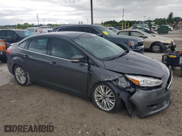 2015 Ford Focus Titanium с VIN 1FADP3J21FL254702, выставлен на аукционе Copart как лот 59872395 с пробегом 93 195 миль миль и Списание • Salvage title. История ставок и продаж доступна на DreamBid. Изображение 4.