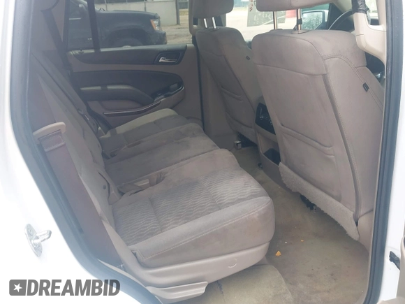 2017 Chevrolet Tahoe LS with VIN 1GNSCAKC7HR342637, listed as a IAAI auction lot 42335097 with 149,736 mi miles and . Bid and sale history available at DreamBid. Image 8.
