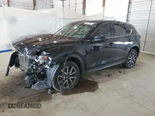 2018 Mazda CX-5 Grand Touring with VIN JM3KFBDM4J0412835, listed as a Copart auction lot 55441315 with 191,968 mi miles and Salvage title. Bid and sale history available at DreamBid. Image 1.