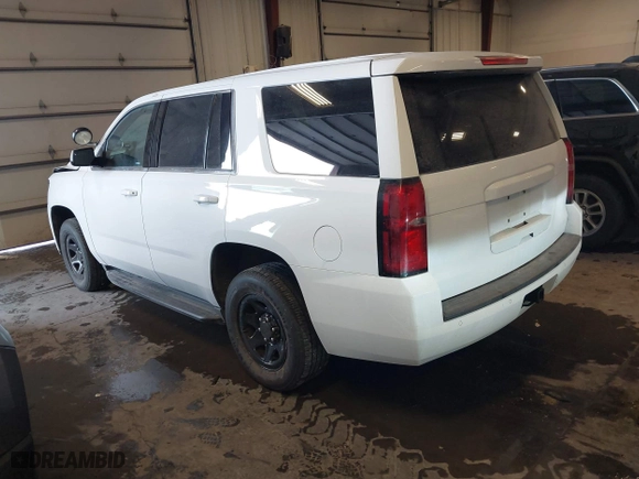 2018 Chevrolet Tahoe Commercial with VIN 1GNSKDEC7JR240082, listed as a IAAI auction lot 41608557 with 111,834 mi miles. Bid and sale history available at carsss.com. Image 3.