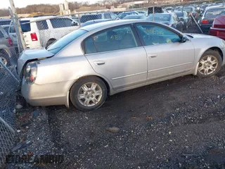 2006 Nissan Altima 2.5 with VIN 1N4AL11D06N385807, listed as a IAAI auction lot 41818211 with 999,999 mi miles. Bid and sale history available at carsss.com. Image 4.