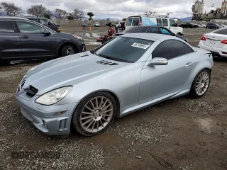 2005 Mercedes-Benz SLK-Class 5.5L AMG with VIN WDBWK73F85F069874, listed as a Copart auction lot 48748865 with 79,391 mi miles and Salvage Title. Bid and sale history available at carsss.com. Image 1.