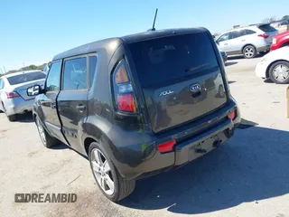 2011 Kia Soul + with VIN KNDJT2A22B7243696, listed as a IAAI auction lot 41762093 with 195,696 mi miles. Bid and sale history available at carsss.com. Image 3.