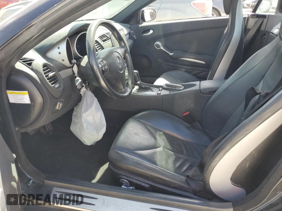 2006 Mercedes-Benz SLK-Class 3.0L with VIN WDBWK54F66F102164, listed as a Copart auction lot 77269014 with 135,786 mi miles and Salvage Title. Bid and sale history available at carsss.com. Image 7.