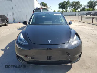2023 Tesla Model Y Long Range z VIN 7SAYGAEE7PF859030, wystawiony jako Copart lot #58965185 z przebiegiem 18 421 mil mil oraz Czysty tytuł • Clean title. Historia ofert i sprzedaży dostępna na DreamBid. Obrazek 5.