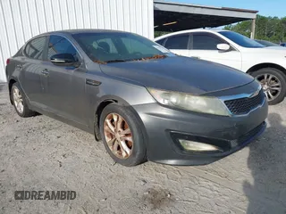 2013 Kia Optima EX z VIN 5XXGN4A73DG091000, wystawiony jako IAAI lot #42555576 z przebiegiem 190 848 mil mil oraz . Historia ofert i sprzedaży dostępna na DreamBid. Obrazek 1.
