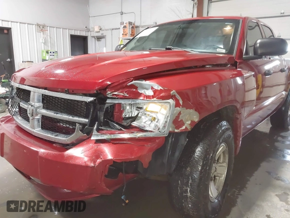 2008 Dodge Dakota SLT z VIN 1D7HW48N38S542692, wystawiony jako IAAI lot #41554521 z przebiegiem 166 482 mil mil oraz . Historia ofert i sprzedaży dostępna na DreamBid. Obrazek 6.