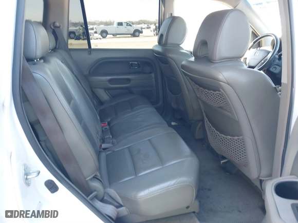 2006 Honda Pilot EX-L with RES with VIN 5FNYF28606B030602, listed as a IAAI auction lot 41392868 with 227,782 mi miles. Bid and sale history available at carsss.com. Image 8.