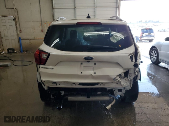 2019 Ford Escape Titanium с VIN 1FMCU0J94KUA44606, выставлен на аукционе Copart как лот 51790035 с пробегом 70 190 миль миль и На запчасти • Non repairable. История ставок и продаж доступна на DreamBid. Изображение 6.