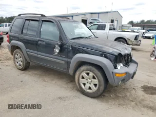 2003 Jeep Liberty Sport with VIN 1J4GK48K73W730795, listed as a Copart auction lot 46468005 with 232,292 mi miles and Salvage Title. Bid and sale history available at DreamBid. Image 4.