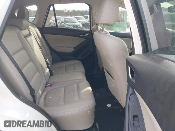 2014 Mazda CX-5 Grand Touring with VIN JM3KE4DY0E0343777, listed as a IAAI auction lot 41464395 with 126,214 mi miles. Bid and sale history available at carsss.com. Image 8.