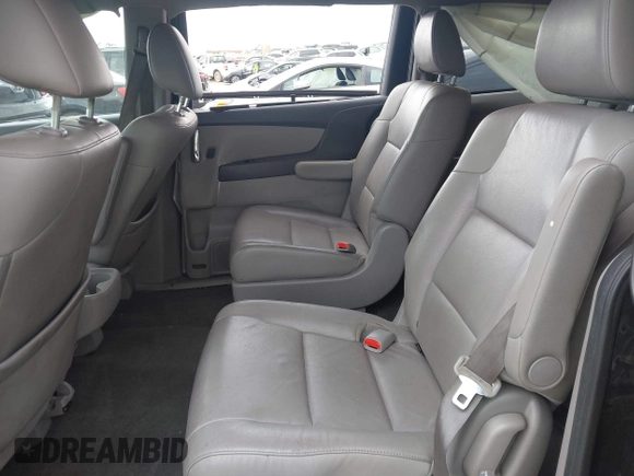 2014 Honda Odyssey EX-L z VIN 5FNRL5H69EB007106, wystawiony jako IAAI lot #41916202 z przebiegiem 164 040 mil mil oraz . Historia ofert i sprzedaży dostępna na DreamBid. Obrazek 8.