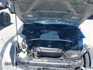 2004 Nissan 350Z Enthusiast z VIN JN1AZ34D74T164233, wystawiony jako IAAI lot #42509421 z przebiegiem 90 780 mil mil oraz . Historia ofert i sprzedaży dostępna na DreamBid. Obrazek 10.