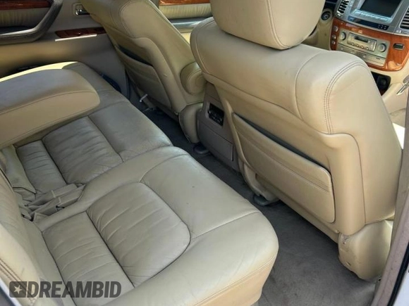 2007 Lexus LX 470 z VIN JTJHT00W174024015, wystawiony jako Copart lot #59439085 z przebiegiem 190 436 mil mil oraz Czysty tytuł • Clean title. Historia ofert i sprzedaży dostępna na DreamBid. Obrazek 6.