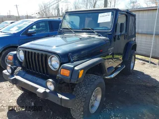 2000 Jeep Wrangler Sport with VIN 1J4FA49S8YP749547, listed as a IAAI auction lot 41861030 with 110,186 mi miles and . Bid and sale history available at DreamBid. Image 17.