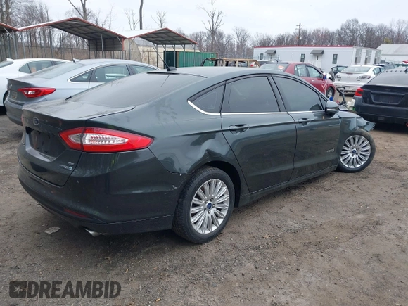 2015 Ford Fusion SE Hybrid with VIN 3FA6P0LU0FR242452, listed as a IAAI auction lot 41790218 with 163,741 mi miles. Bid and sale history available at carsss.com. Image 4.