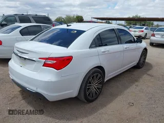 2014 Chrysler 200 LX with VIN 1C3CCBAB1EN210802, listed as a IAAI auction lot 42119888 with 154,808 mi miles and . Bid and sale history available at carsss.com. Image 4.