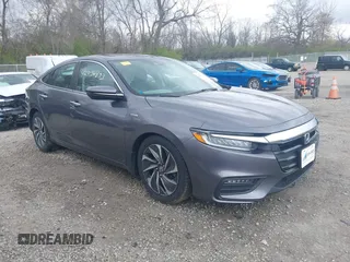 2021 Honda Insight Touring with VIN 19XZE4F91ME005517, listed as a IAAI auction lot 42036493 with 65,404 mi miles and . Bid and sale history available at carsss.com. Image 1.