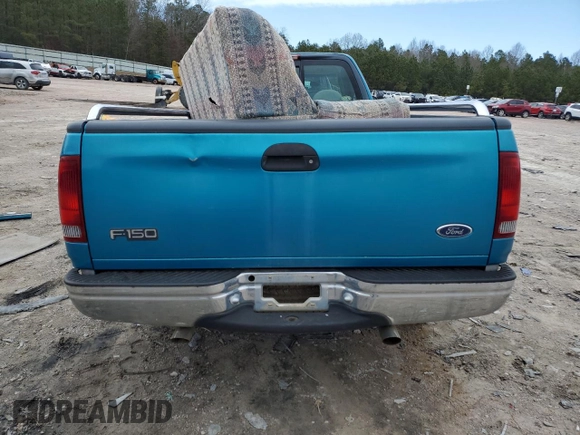 1998 Ford F-150 z VIN 1FTDF17W2WNA09312, wystawiony jako Copart lot #48290845 z przebiegiem 167 417 mil mil oraz Szkoda całkowita • Salvage title. Historia ofert i sprzedaży dostępna na DreamBid. Obrazek 6.