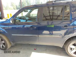 2013 Honda Pilot Touring with VIN 5FNYF4H95DB079782, listed as a IAAI auction lot 42737391 with 152,830 mi miles and . Bid and sale history available at DreamBid. Image 14.