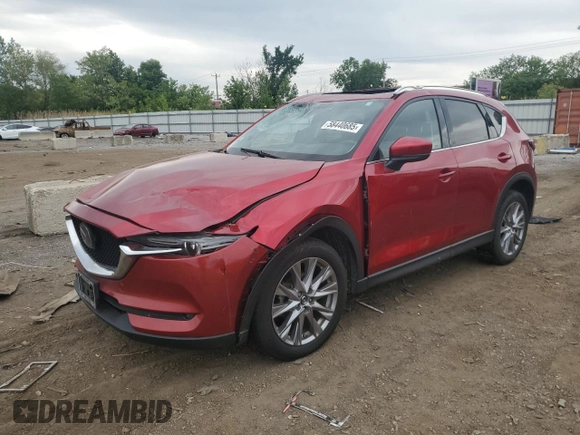 2019 Mazda CX-5 Grand Touring z VIN JM3KFBDM2K0665993, wystawiony jako Copart lot #58440685 z przebiegiem 38 306 mil mil oraz Szkoda całkowita • Salvage title. Historia ofert i sprzedaży dostępna na DreamBid. Obrazek 1.