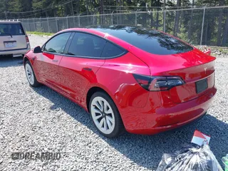 2021 Tesla Model 3 Long Range with VIN 5YJ3E1EB6MF054361, listed as a IAAI auction lot 42105247 with 58,986 mi miles and . Bid and sale history available at carsss.com. Image 3.