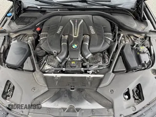 2018 BMW 5 Series M550i xDrive with VIN WBAJB9C57JB035521, listed as a Copart auction lot 54177125 with 63,924 mi miles and Clean Title. Bid and sale history available at carsss.com. Image 7.